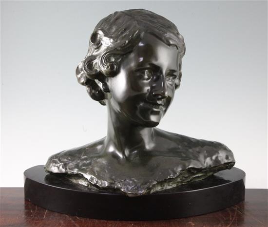 A 20th century French bronze bust of a young woman, 14in.